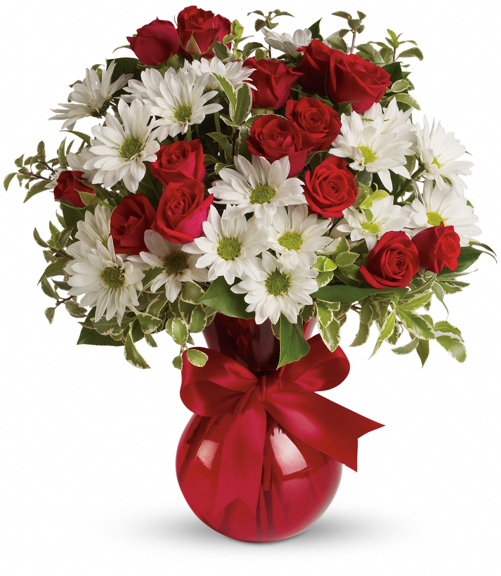 red and white flowers in a vase