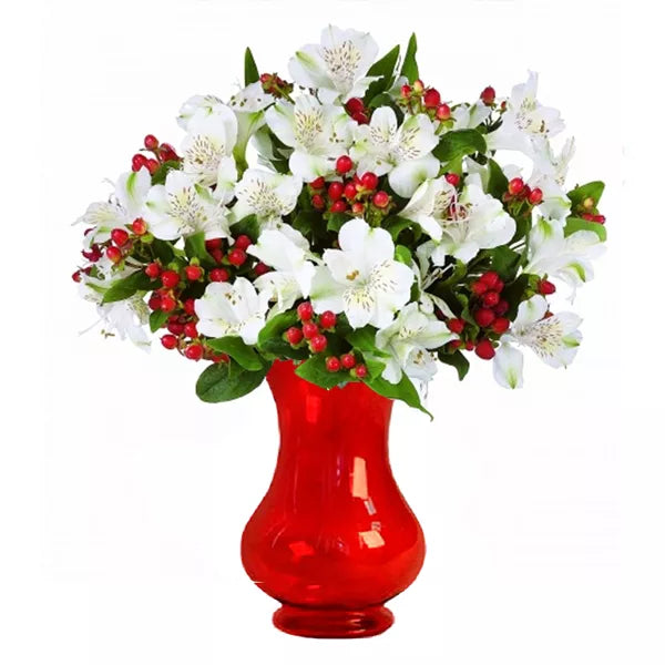 Holiday alstroemeria blooms in red vase