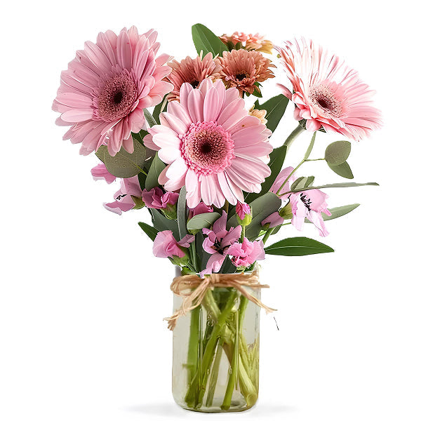 pink flowers in a mason jar